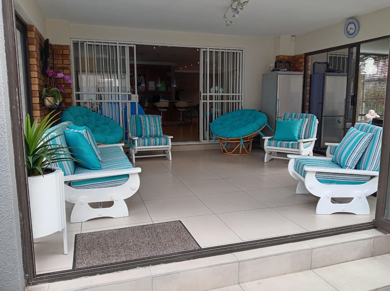 Turquoise striped patio lounge set